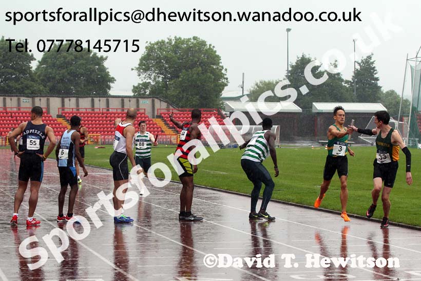 Glasgow change-over during the 4 x 400 metres relay in the worst conditions of the day, British National League, Division 1, Gateshead. Photo: David T. Hewitson/Sports for All Pics